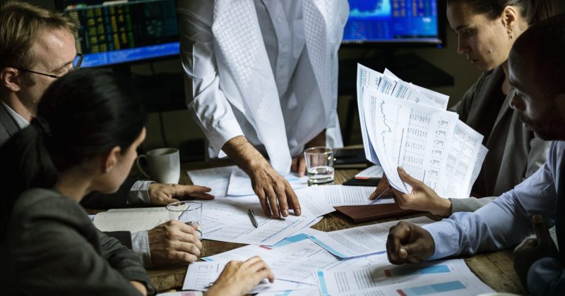 Group of business people working together in a meeting room